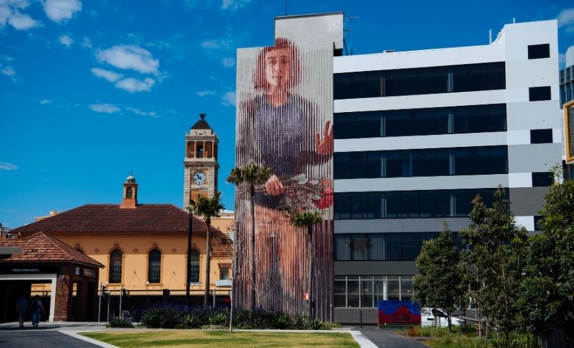 Fintan Magee mural at Museum Park Fintan Magee large-scale mural at Museum Park in Newcastle